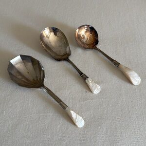3 Antique Pearl handled serving spoons